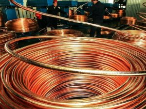 Copper trades higher on weaker dollar, easing China Covid curbs